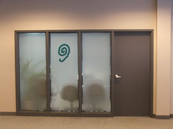 Office meeting room with privacy frosting and logo