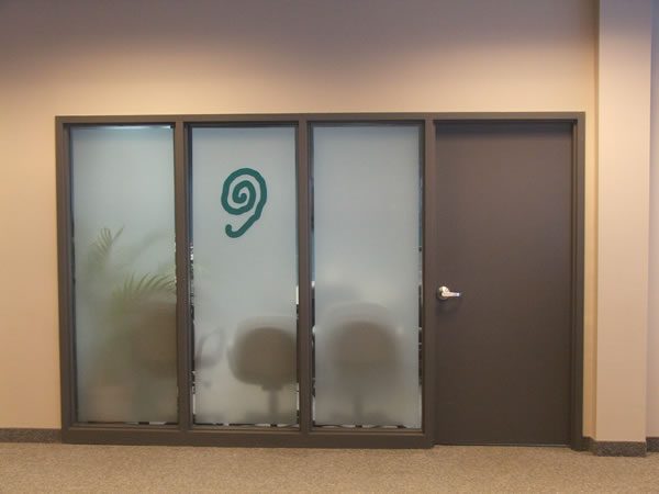 meeting room with privacy frosting and company logo
